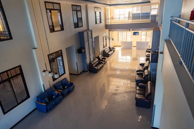 Patient consultation room with modern medical equipment and comfortable seating